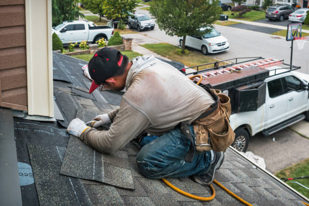 Professional Roofing technician working in New Virginia, IA